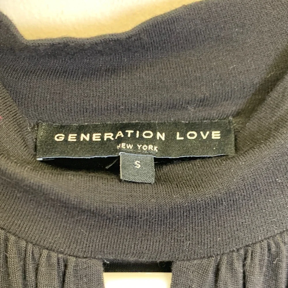 Generation Love Black Top with Sheer Polka Dot Sleeves